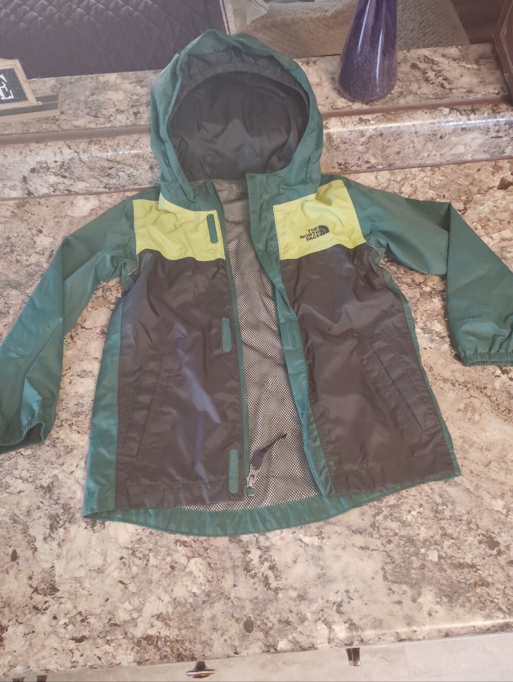 The North Face Kids Green and Lime Hooded Rain Jacket